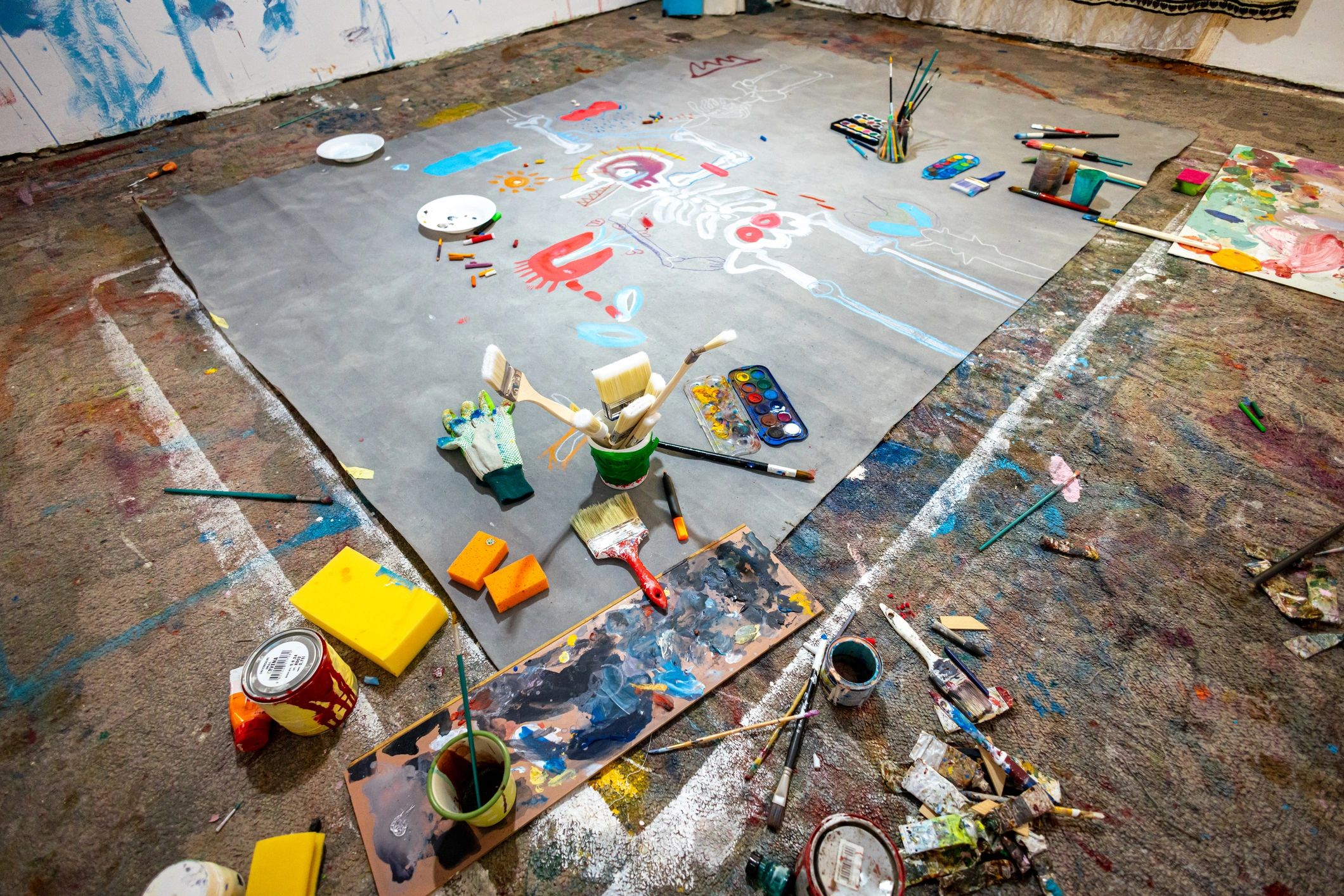 Art studio workspace supporting printmaking and creative production